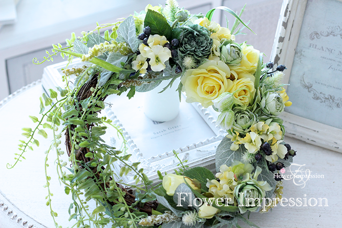 アーティフィシャフルラワー 造花 のナチュラルなビタミンカラーのリースです Flower Impression